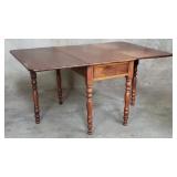 Antique walnut gate leg drop leaf dining table