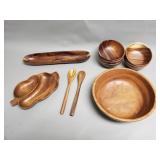 Group of wood bowls, salad set, and trays