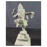 Brass Ganesha figure depicted in a dancing pose