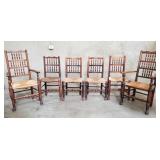 6 Antique dark oak spindle back chairs with rush