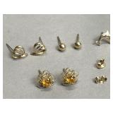 14k gold stud earrings, 3 pairs and a single