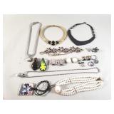 Group of costume jewelry necklaces, earrings, etc