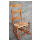 Vintage ladder back pine rocking chair with rush
