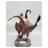 Industrial metal fish sculpture