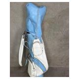 Vintage leather Burton golf bag with clubs