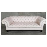 Contemporary upholstered tufted sofa