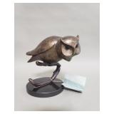 SPI Gallery brass owl sculpture on black onyx bass