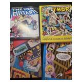 Lot of 4 super hero collectibles and coloring book