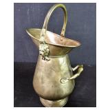 Vintage copper and brass pitcher with lion head