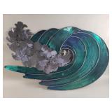 Signed metal wall sculpture