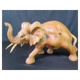Carved wood elephant figure