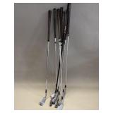 Set of nine golf clubs