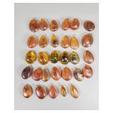 Group of resin pendants with bugs