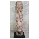 African carved wood statue on metal base