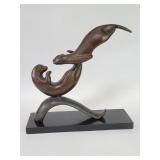 SPI bronze otter sculpture on a marble base