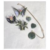 Jade butterfly brooches, Sagittarius pendant on a