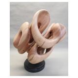 Carved wood abstract on a marble base