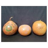 Three signed gourds with floral and geometric