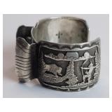 Sterling silver signed R. W. Navajo story teller