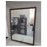 Antique carved wood frame wall mirror