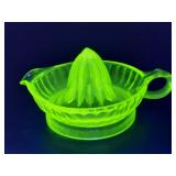 Vintage uranium glass juicer with handle