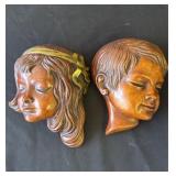 Pair of vintage German wall masks