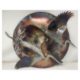 Signed metal wall sculpture