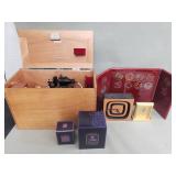 Box of miscellaneous items desk clocks,