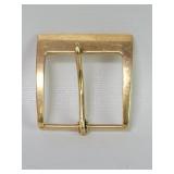 14k gold belt buckle inscribed "The Great Mind