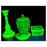 4pc uranium glass pieces, cookie jar, candlestick