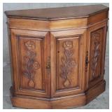 Walnut veneer cabinet with floral motifs