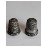 Pair of sterling silver thimbles 9.3g.