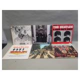 Six Beatles LP records