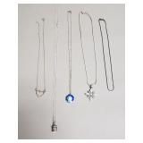 Group of sterling silver necklaces and pendants
