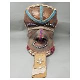 Vintage African tribal helmet/mask adorned with