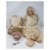 Pair of vintage/antique porcelain-head dolls,