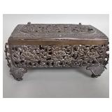 Vintage pierced bronze casket with floral motif