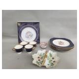 Group of porcelain and ceramic plates and teacups