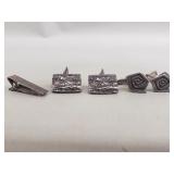 Group of sterling silver cufflinks and tie clip