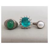 Three sterling silver rings with semi precious