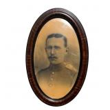 Antique bubble glass framed portrait