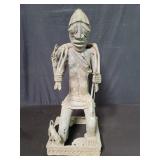 African brass sculpture depicting a Benin hunter