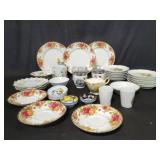 Group of porcelain and ceramic mugs, saucers,