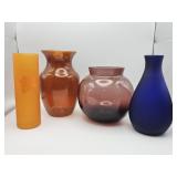 Assorted colored art glass vases and candleholder