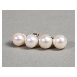 14k gold and pearl studs.