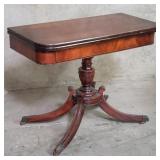 Brandt mahogany flip top game table on casters
