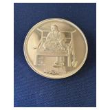 Gold plated Asian commemorative coin