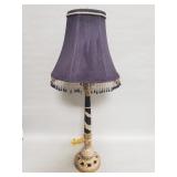 Contemporary composite table lamp with a velvet