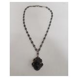 Taxco sterling silver and onyx face mask pendant