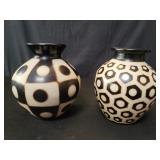 Pair of signed pottery vases
